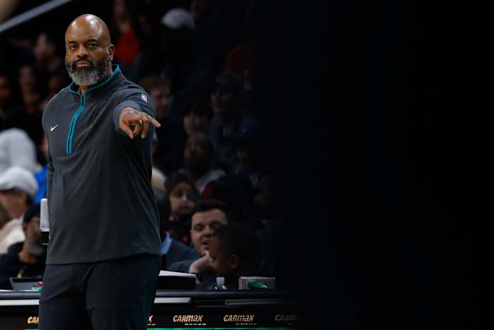 Washington Wizards head coach Wes Unseld Jr. gestures from the bench against the Orlando Magic in the second quarter at Capital One Arena.
